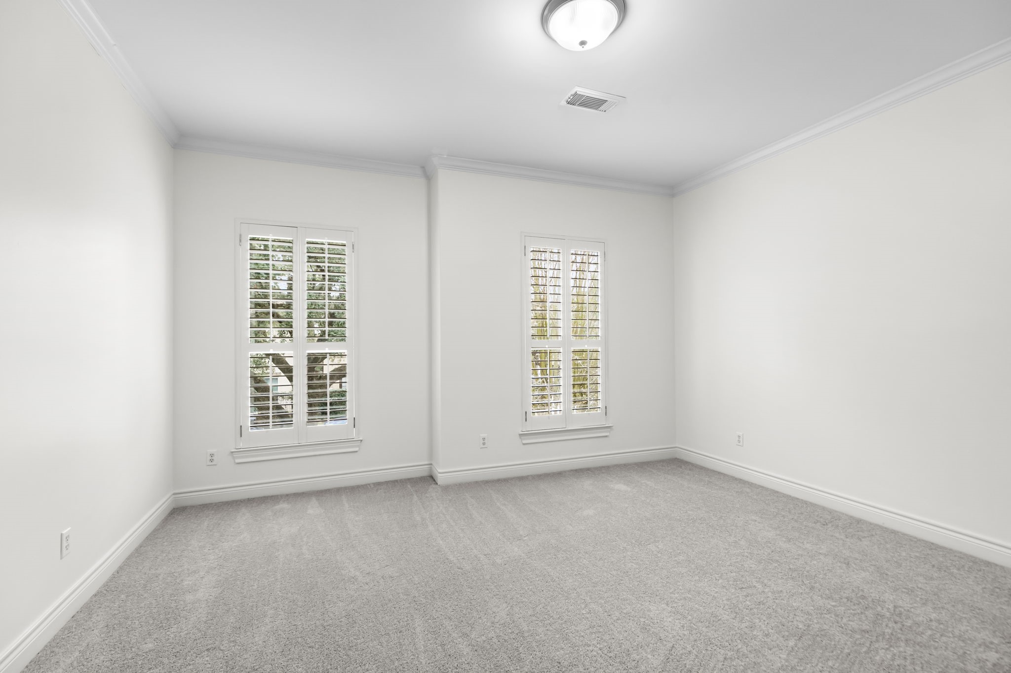 4026 Gramercy Street Houston, TX 77025 - Photo 21 of 35 an empty room with a empty space and windows