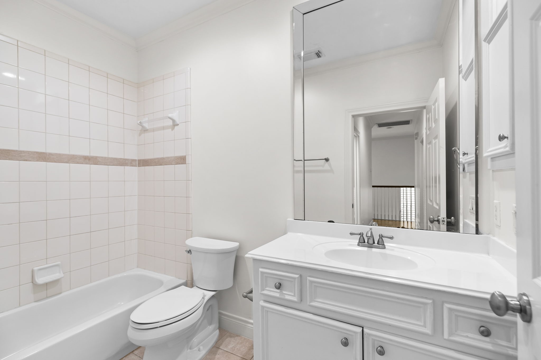 4026 Gramercy Street Houston, TX 77025 - Photo 23 of 35 a bathroom with a sink a toilet and shower