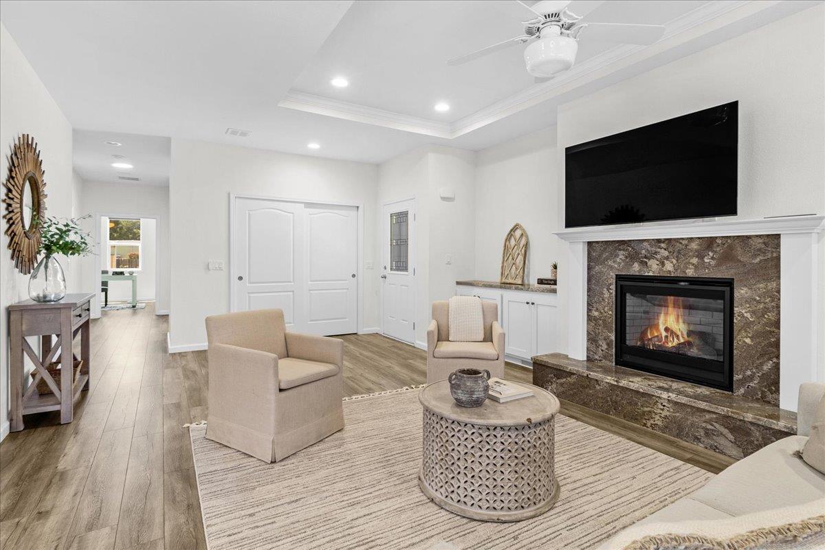 225 Mt Hermon Road, Unit 88 Scotts Valley, CA 95066 - Photo 11 of 50 a living room with furniture a flat screen tv and a fireplace