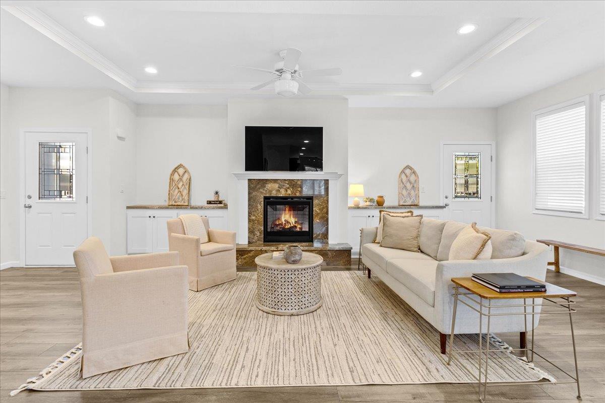 225 Mt Hermon Road, Unit 88 Scotts Valley, CA 95066 - Photo 12 of 50 a living room with furniture a flat screen tv and a fireplace