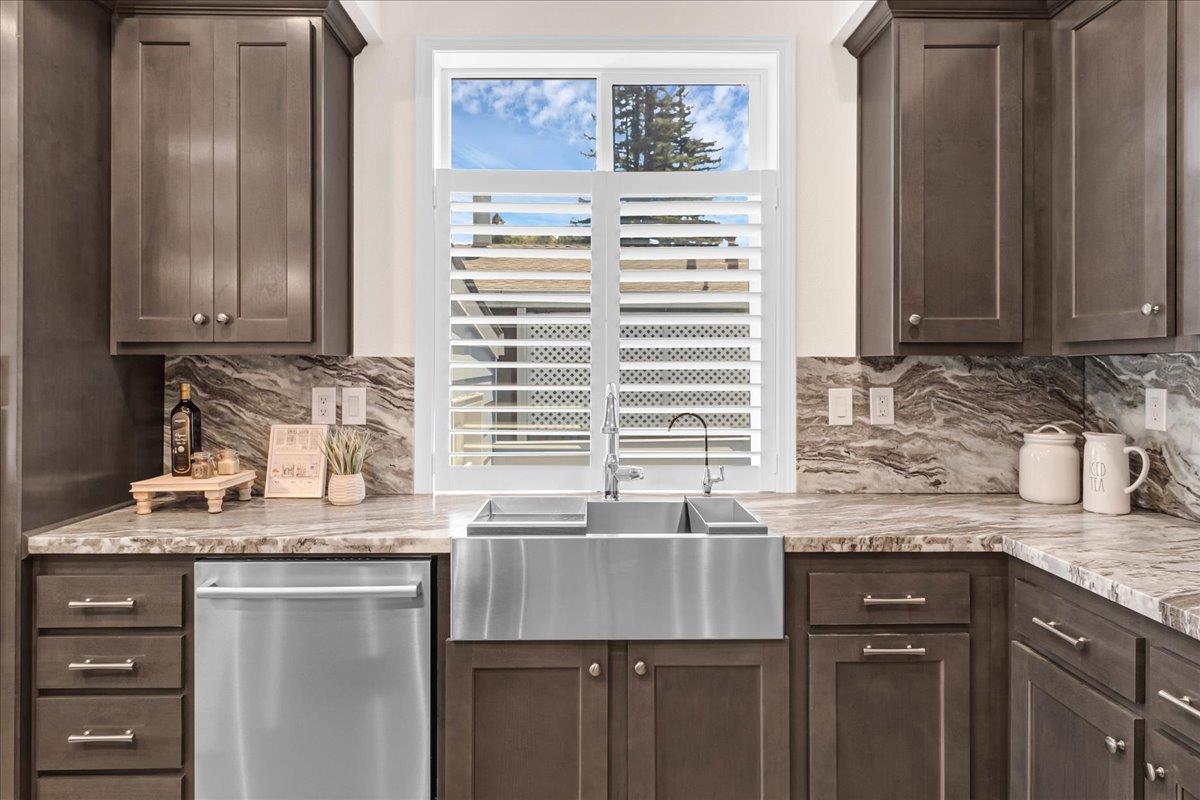 225 Mt Hermon Road, Unit 88 Scotts Valley, CA 95066 - Photo 16 of 50 a kitchen with granite countertop a sink and a window