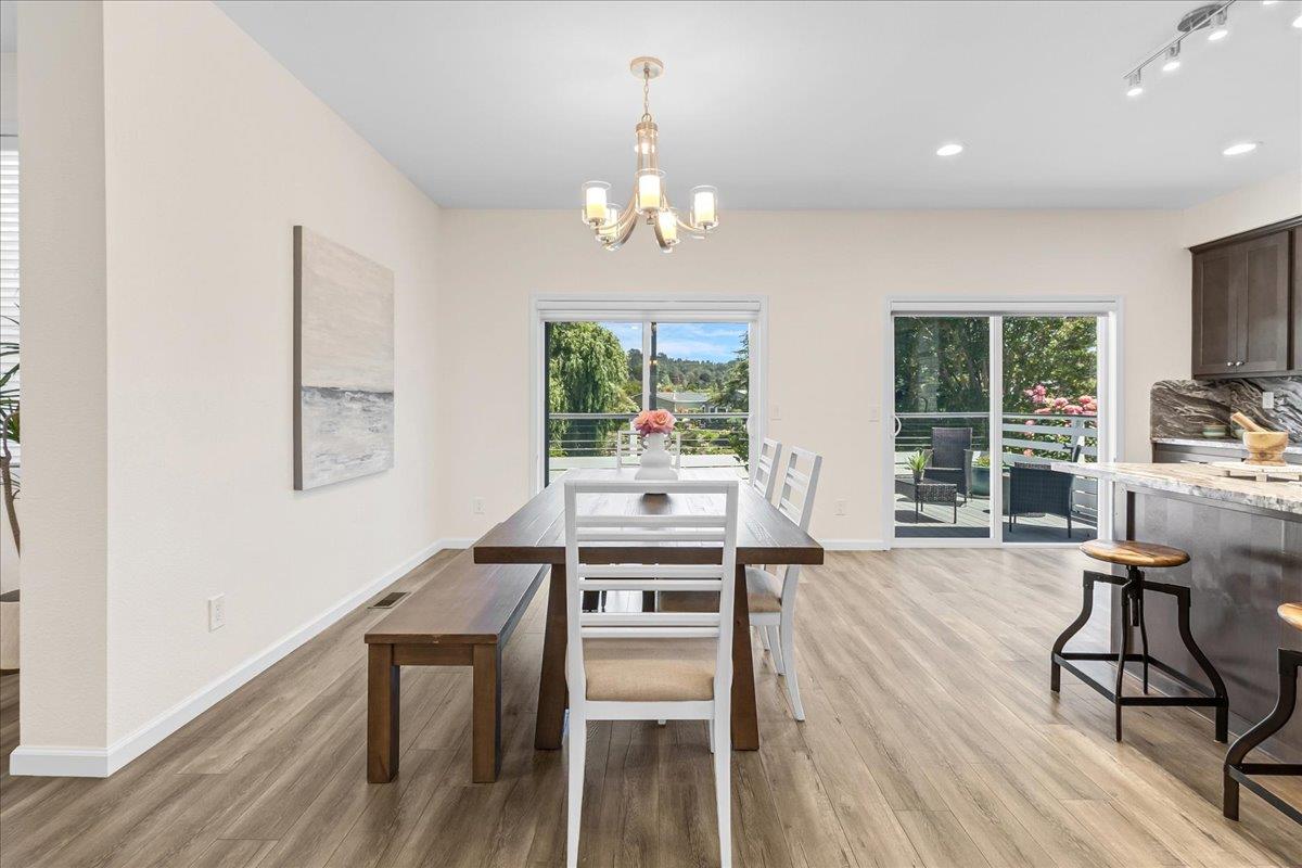 225 Mt Hermon Road, Unit 88 Scotts Valley, CA 95066 - Photo 18 of 50 a view of a dining room with furniture window and wooden floor