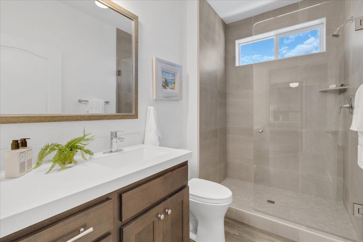 225 Mt Hermon Road, Unit 88 Scotts Valley, CA 95066 - Photo 31 of 50 a bathroom with a sink a toilet and shower