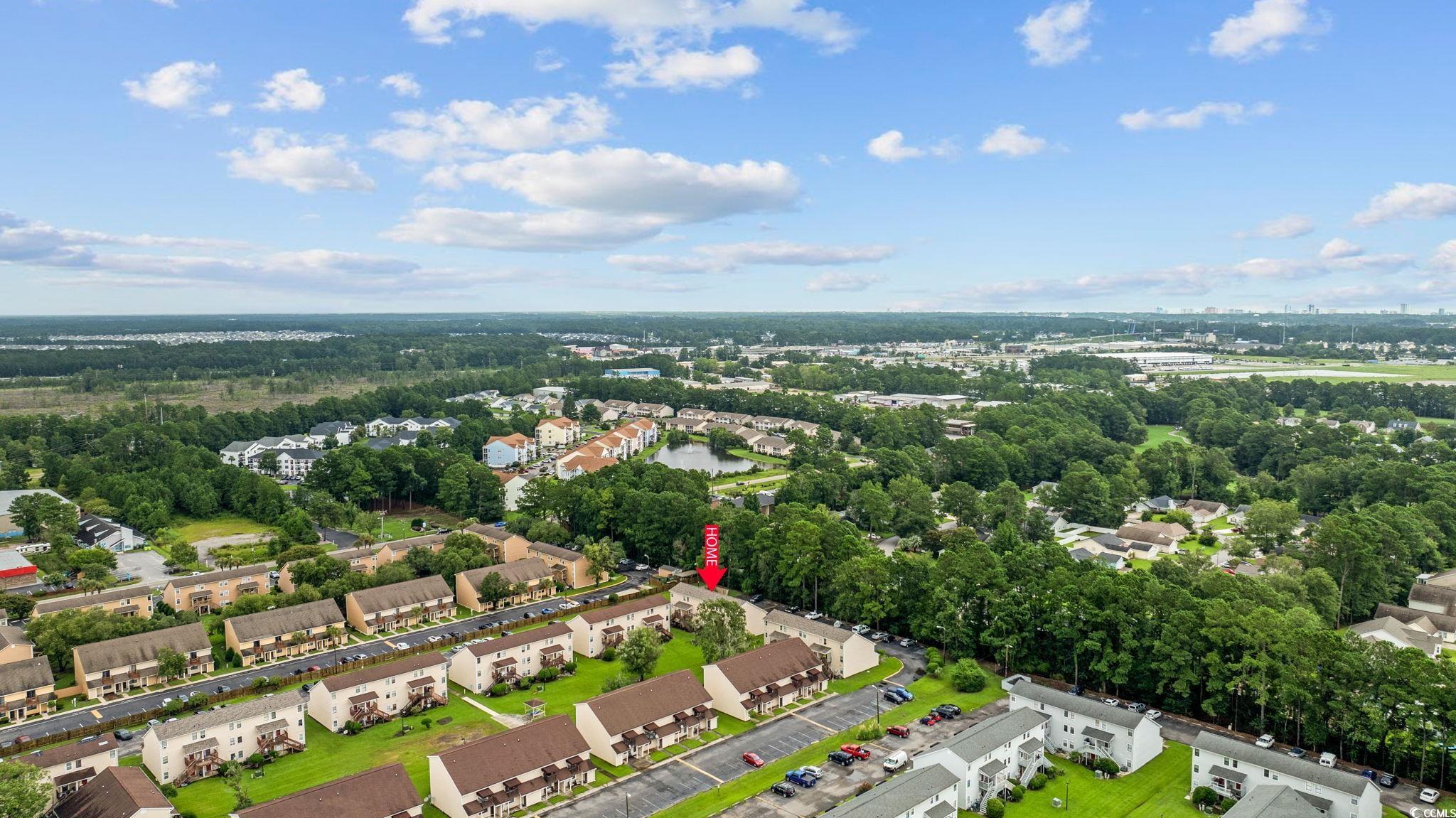 755 Burcale Road, Unit F4 Myrtle Beach, SC 29579 - Photo 30 of 30 Aerial view of a tree filled landscape