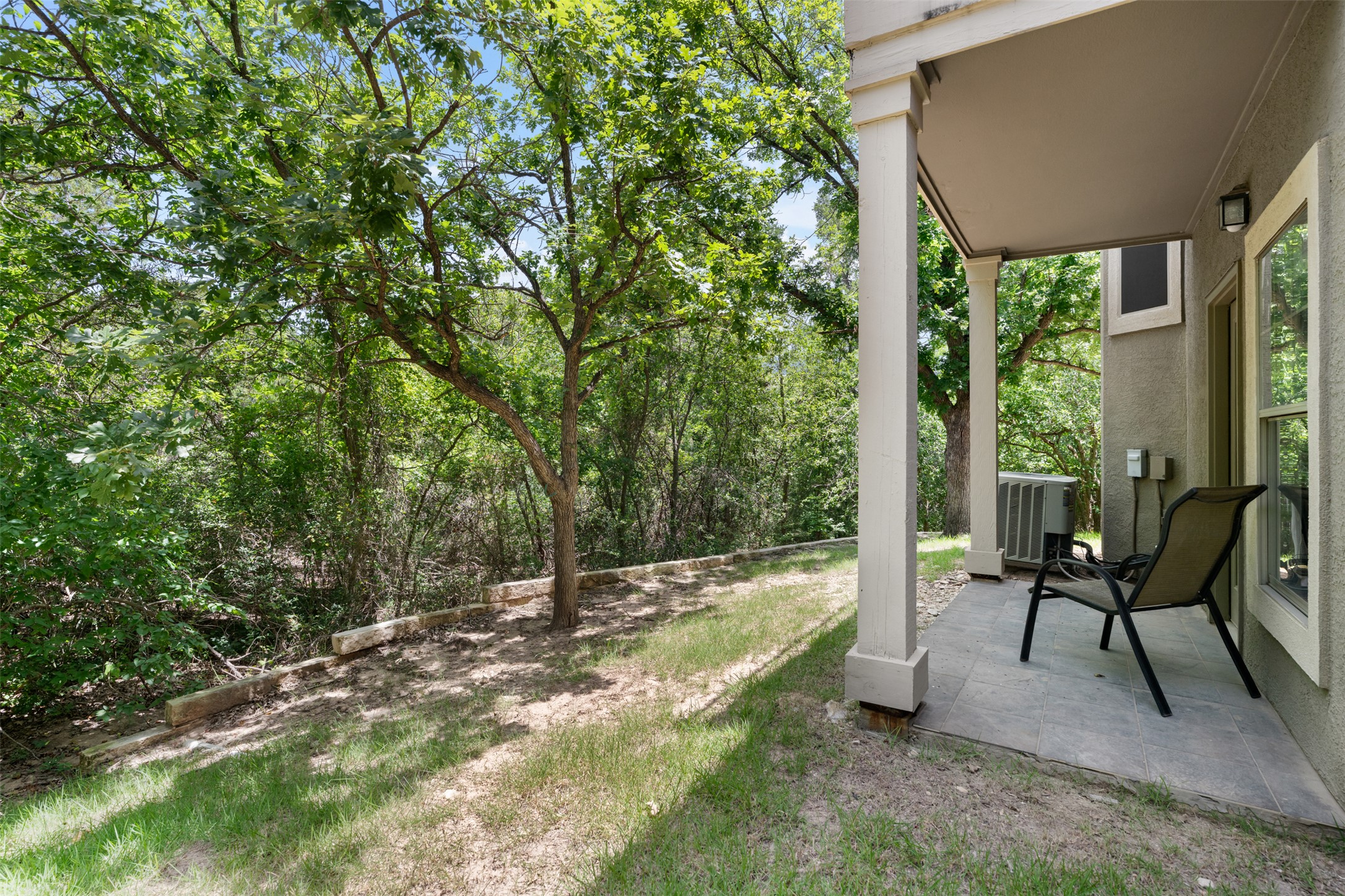 11203 Ranch Road 2222, Unit 1407 Austin, TX 78732 - Photo 16 of 40 Step off your patio and take a stroll around the wooded grounds.