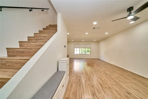 a view of entryway with wooden floor