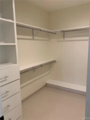 a view of an empty walk in closet