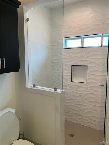 a bathroom with a toilet