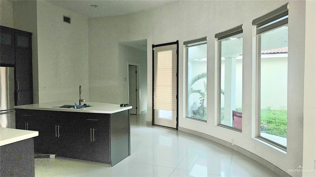 1304 Gran Via Street Pharr, TX 78577 - Photo 5 of 13 a spacious bathroom with a bathtub and a sink