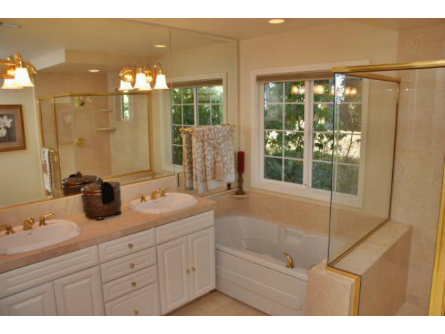796 Nash Road Los Altos, CA 94024 - Photo 11 of 18 a bathroom with a double vanity sink and a mirror