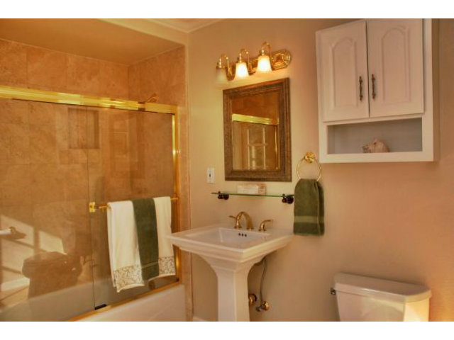 796 Nash Road Los Altos, CA 94024 - Photo 13 of 18 a bathroom with a sink and a mirror