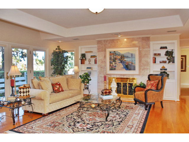 796 Nash Road Los Altos, CA 94024 - Photo 6 of 18 a living room with furniture and painting on the wall