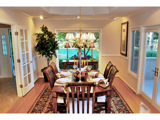796 Nash Road Los Altos, CA 94024 - Photo 7 of 18 a view of a dining room with furniture window and wooden floor