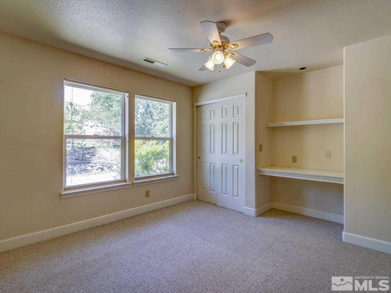 20575 Cooke Drive Reno, NV 89521 - Photo 13 of 25 a view of room with window and ceiling fan