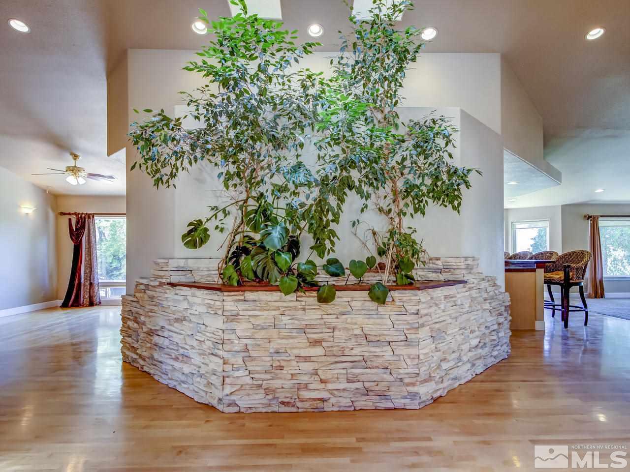 20575 Cooke Drive Reno, NV 89521 - Photo 2 of 25 a view of a living room with furniture and a potted plant