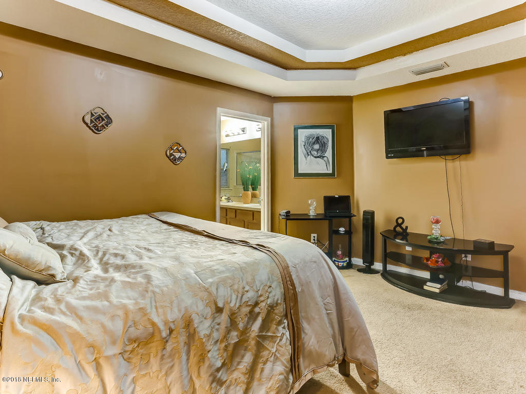11873 Raindrop Road Jacksonville, FL 32219 - Photo 29 of 47 Master bedroom
