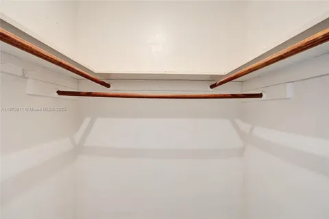 a close up of a bathtub in a shelf