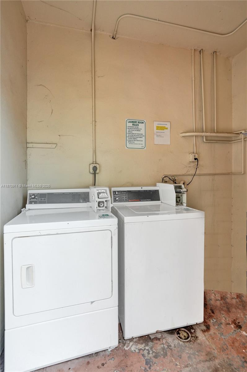 4731 Northwest 10th Court, Unit 314 Plantation, FL 33313 - Photo 20 of 26 a utility room with dryer and washer