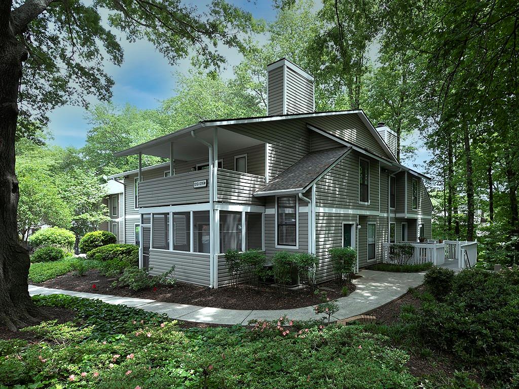 1316 Wynnes Ridge Circle Southeast Marietta, GA 30067 - Photo 2 of 29 a front view of a house with a yard