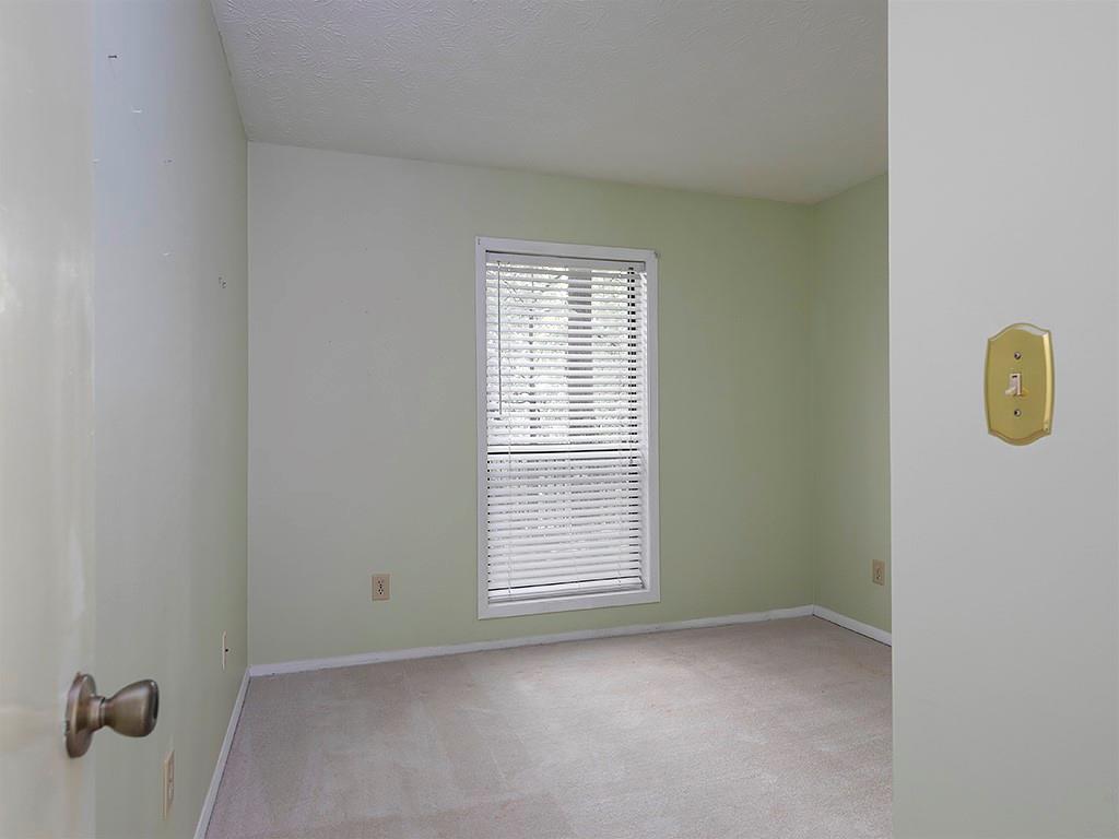 1316 Wynnes Ridge Circle Southeast Marietta, GA 30067 - Photo 23 of 29 a view of an empty room with a window