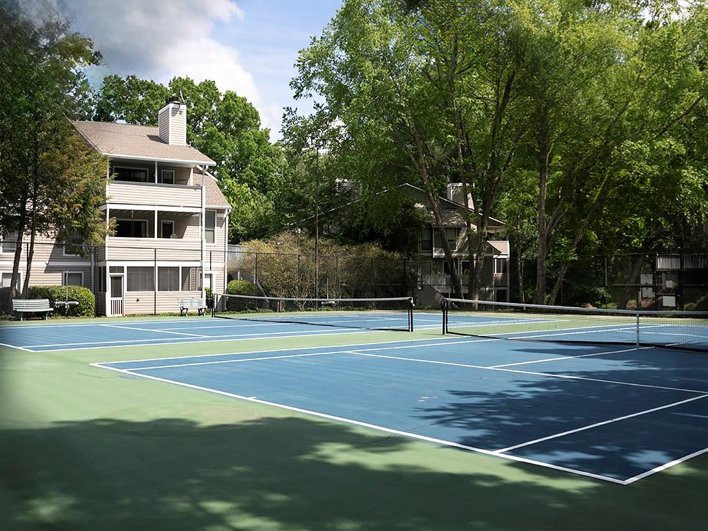 1316 Wynnes Ridge Circle Southeast Marietta, GA 30067 - Photo 29 of 29 a view of a tennis ground with large trees