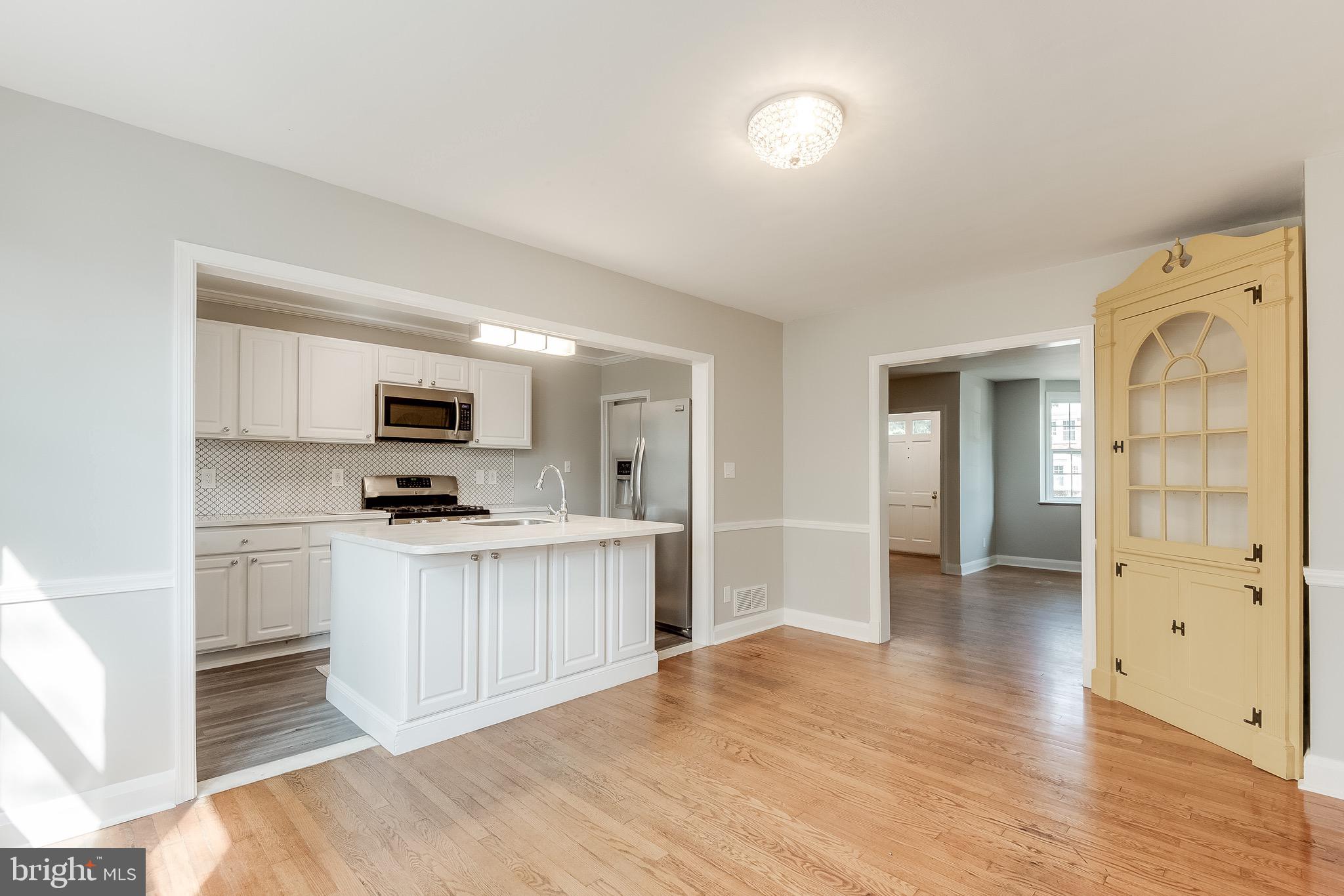 207 Blenheim Road Baltimore, MD 21212 - Photo 13 of 37 Open Kitchen w/ Built In Hutch at Dining Room