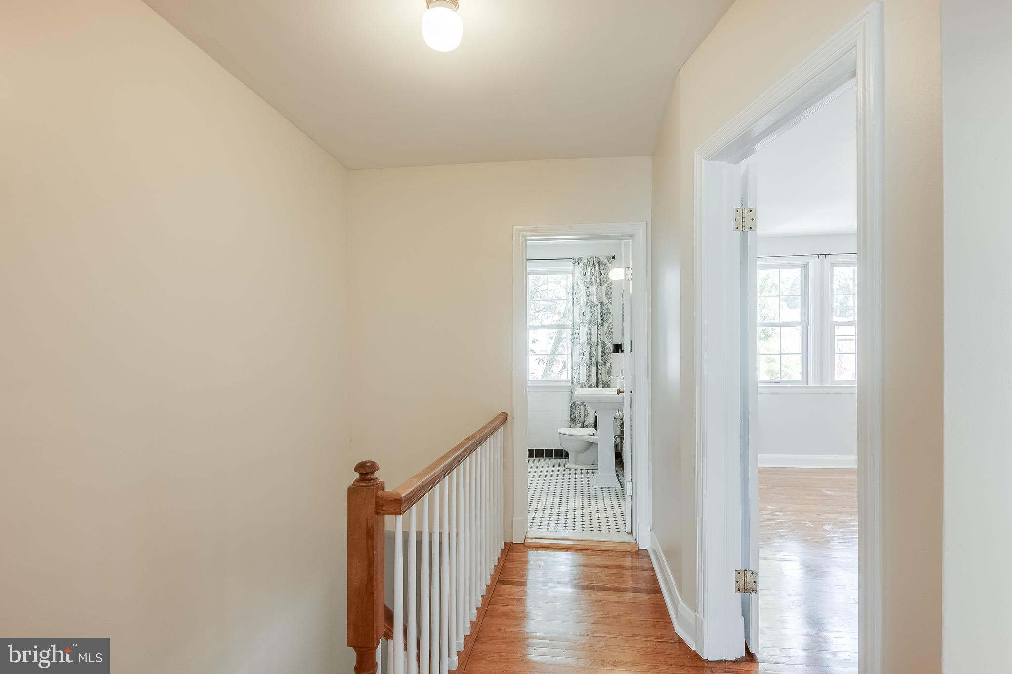 207 Blenheim Road Baltimore, MD 21212 - Photo 14 of 37 Hardwood at Hallway Upstairs