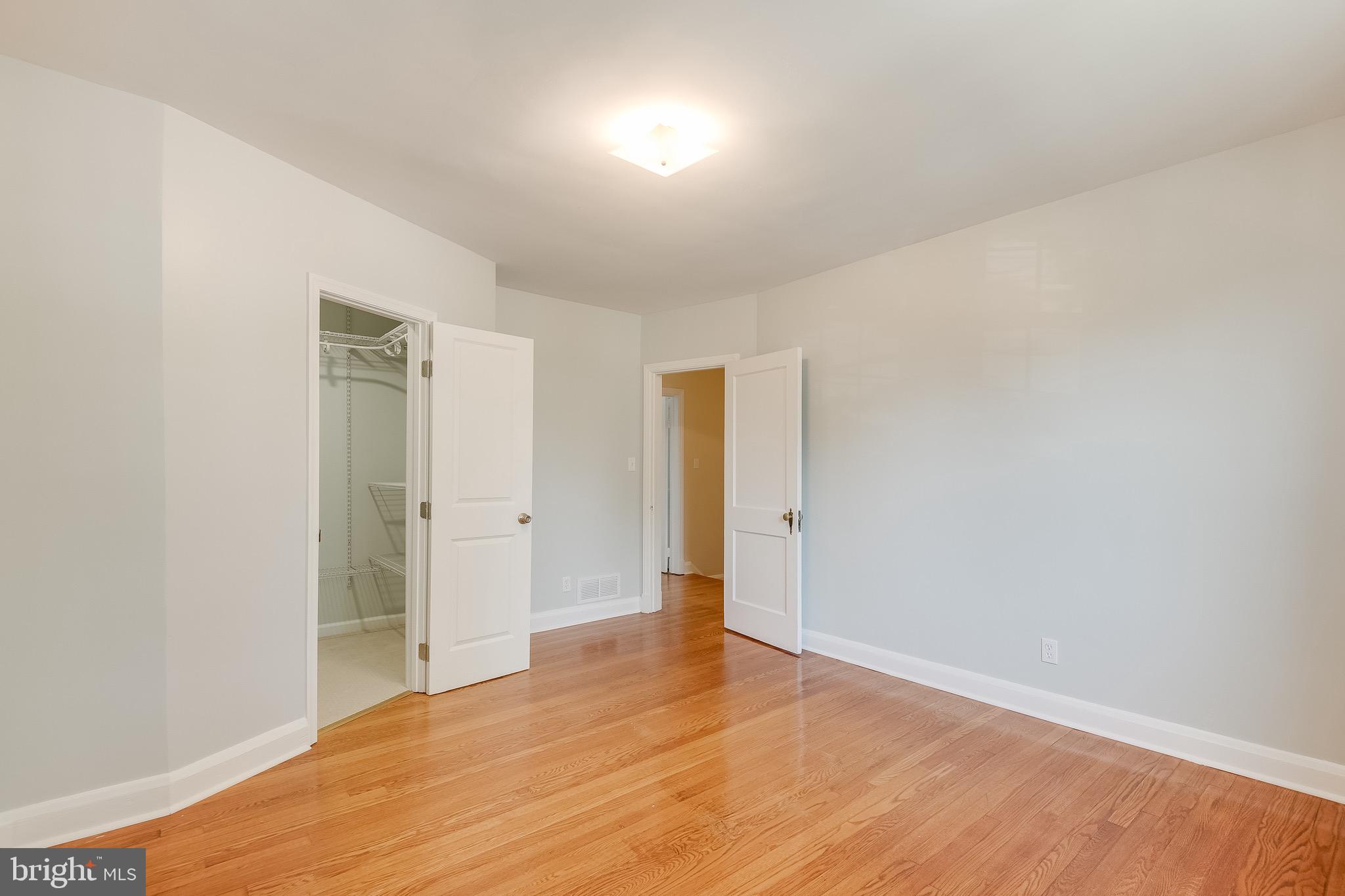 207 Blenheim Road Baltimore, MD 21212 - Photo 20 of 37 Bedroom Three w/ hardwood and fresh paint