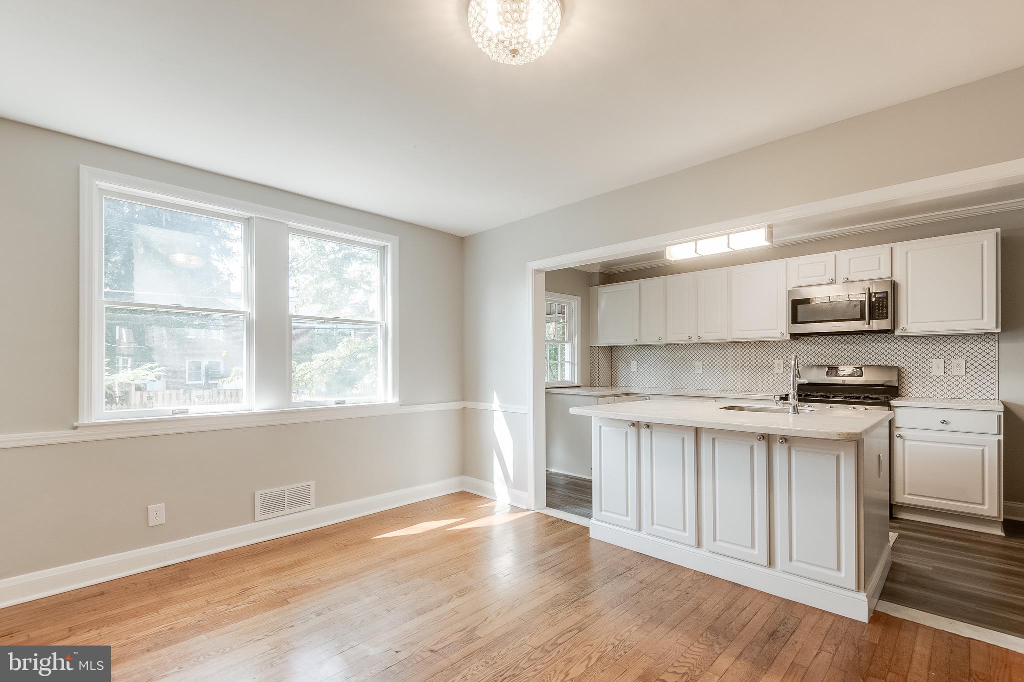 207 Blenheim Road Baltimore, MD 21212 - Photo 3 of 37 Open Concept Kitchen and Dining Room