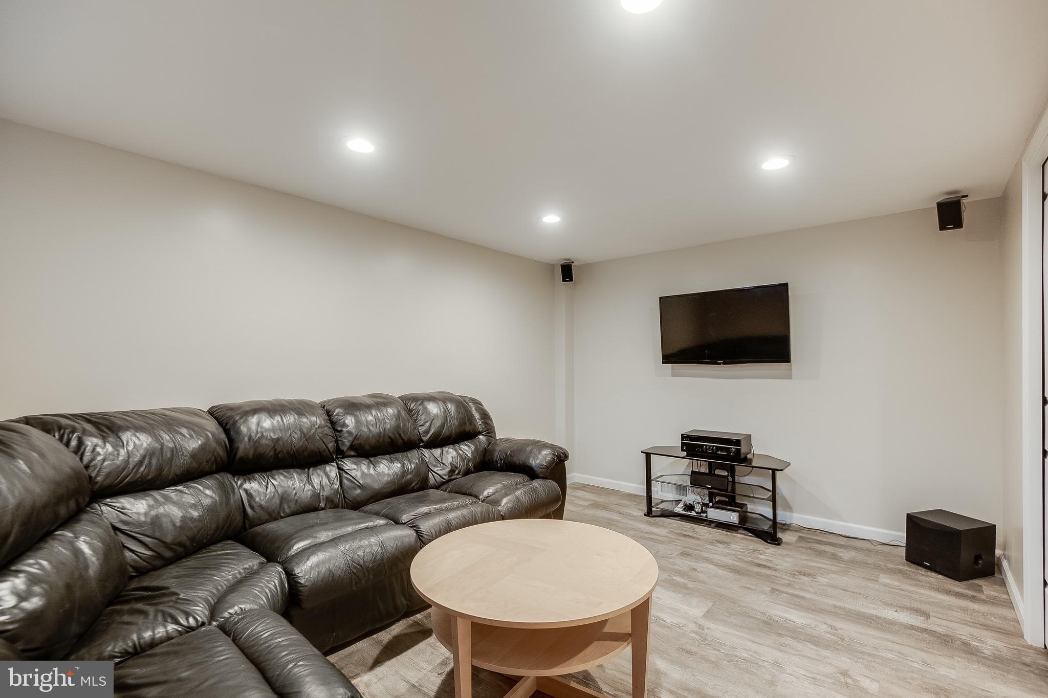 207 Blenheim Road Baltimore, MD 21212 - Photo 5 of 37 Rec Room at Lower Level w/ LVP Floors