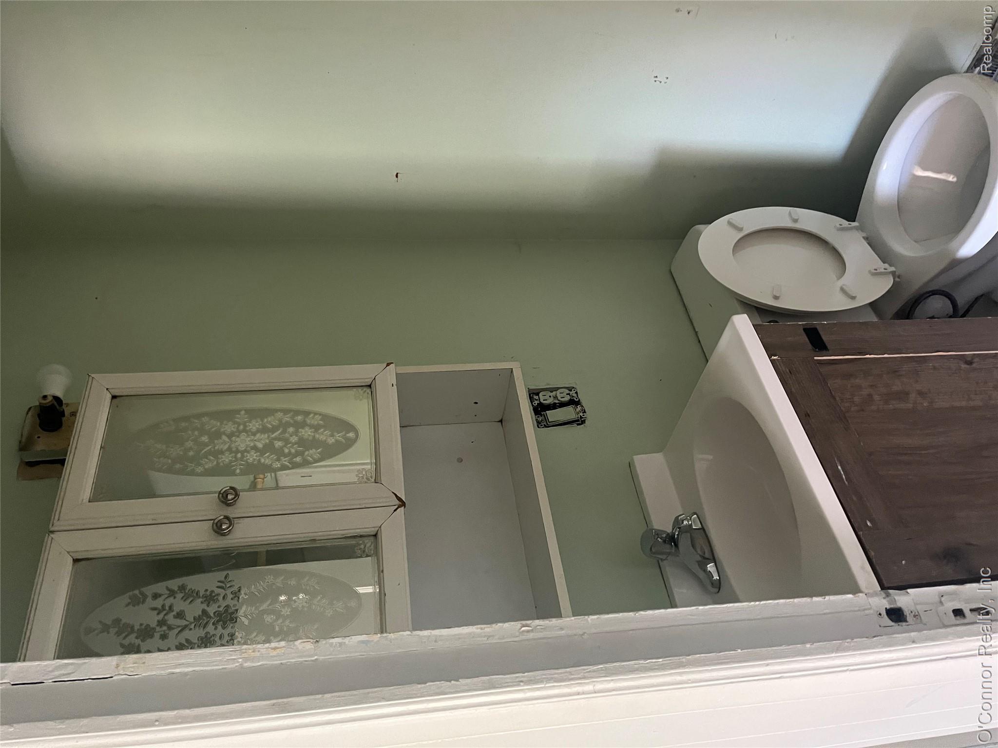 1908 Range Road Port Huron, MI 48060 - Photo 8 of 16 Half bathroom featuring vanity and toilet