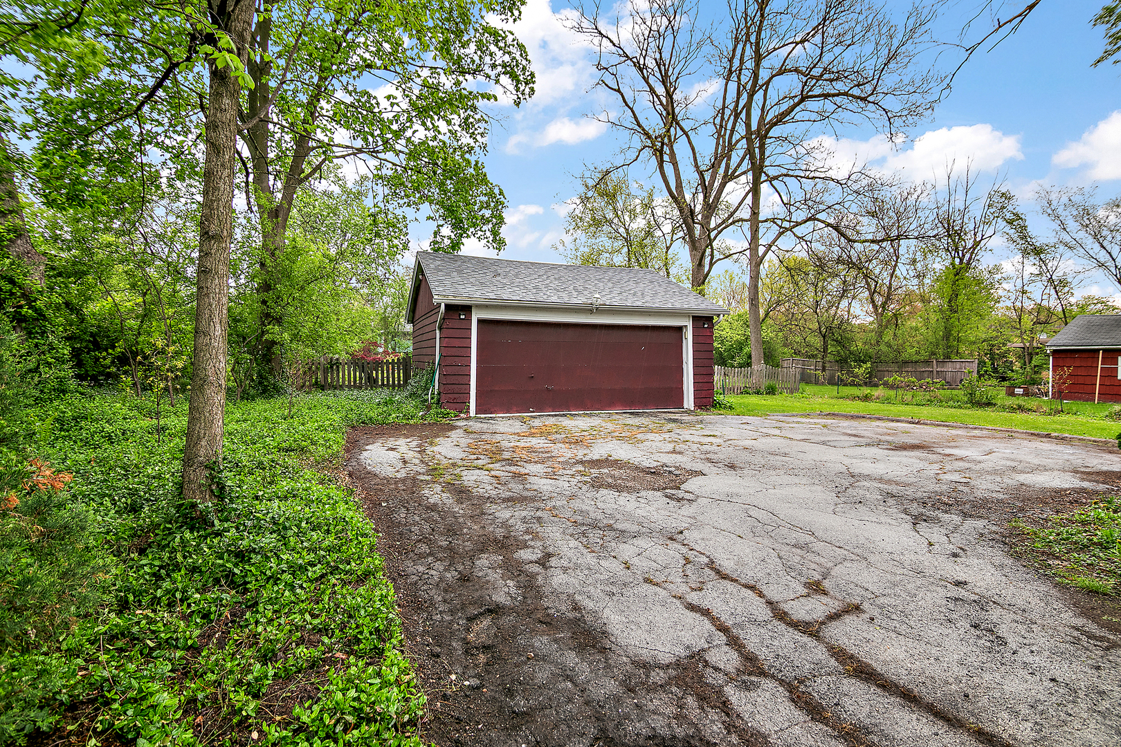 2444 183rd Street Homewood, IL 60430 - Photo 23 of 25 a front view of a house with a yard and garage