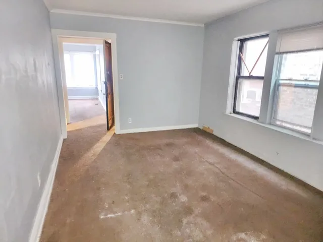 an empty room with windows