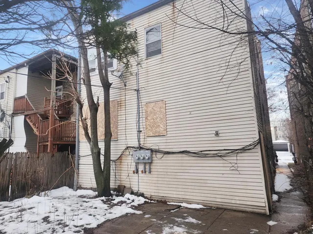 a view of a backyard of the house