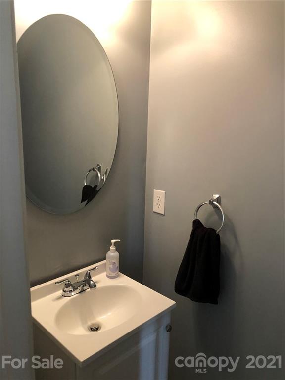 123 Chimney Rock Lane Fort Mill, SC 29708 - Photo 15 of 30 a bathroom with a sink and mirror