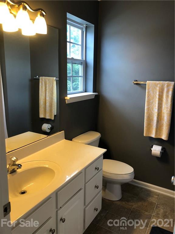 123 Chimney Rock Lane Fort Mill, SC 29708 - Photo 23 of 30 a bathroom with a sink toilet and window