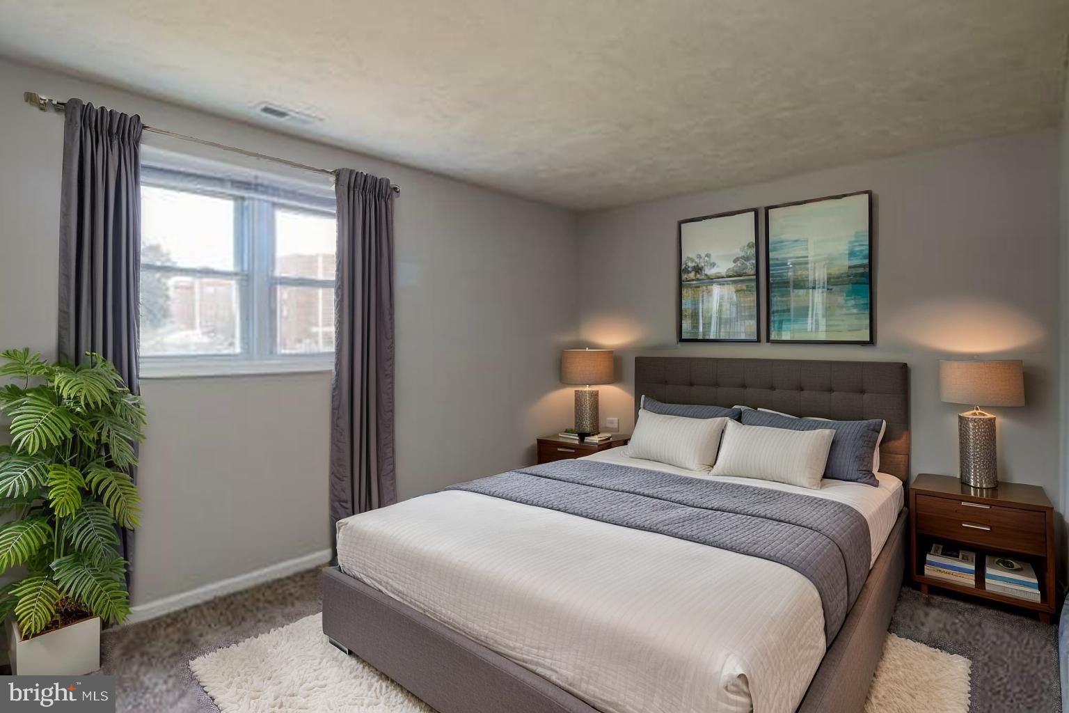 509 Spruce Avenue Pitman, NJ 08071 - Photo 17 of 25 a bedroom with a bed and a window