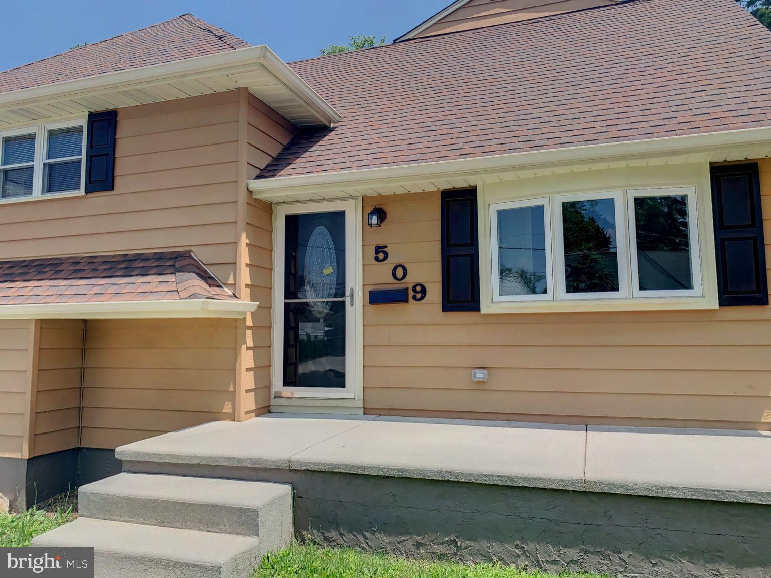 509 Spruce Avenue Pitman, NJ 08071 - Photo 2 of 25 a view front of house with a entrance door