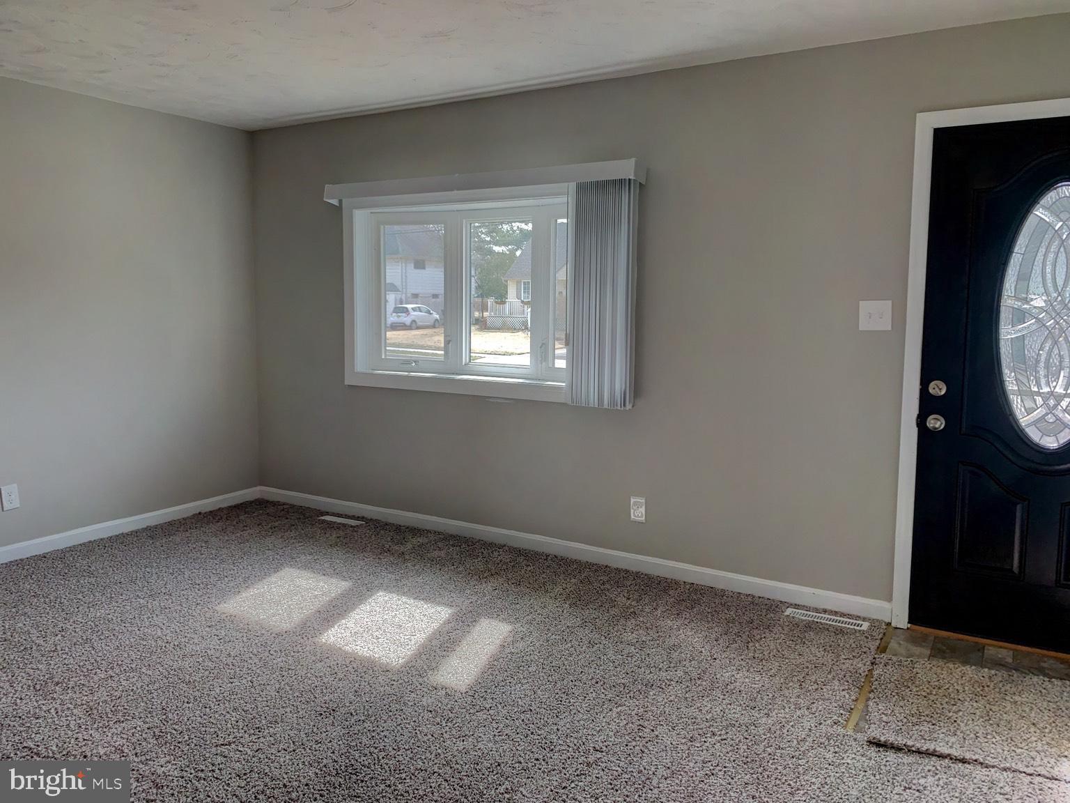 509 Spruce Avenue Pitman, NJ 08071 - Photo 9 of 25 an empty room with windows