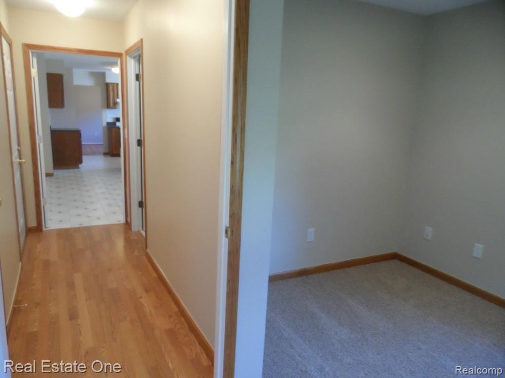 2684 Cole Road Lake Orion, MI 48362 - Photo 20 of 31 Back Hall view from BR 4, Laundry/Lav 1st door on right