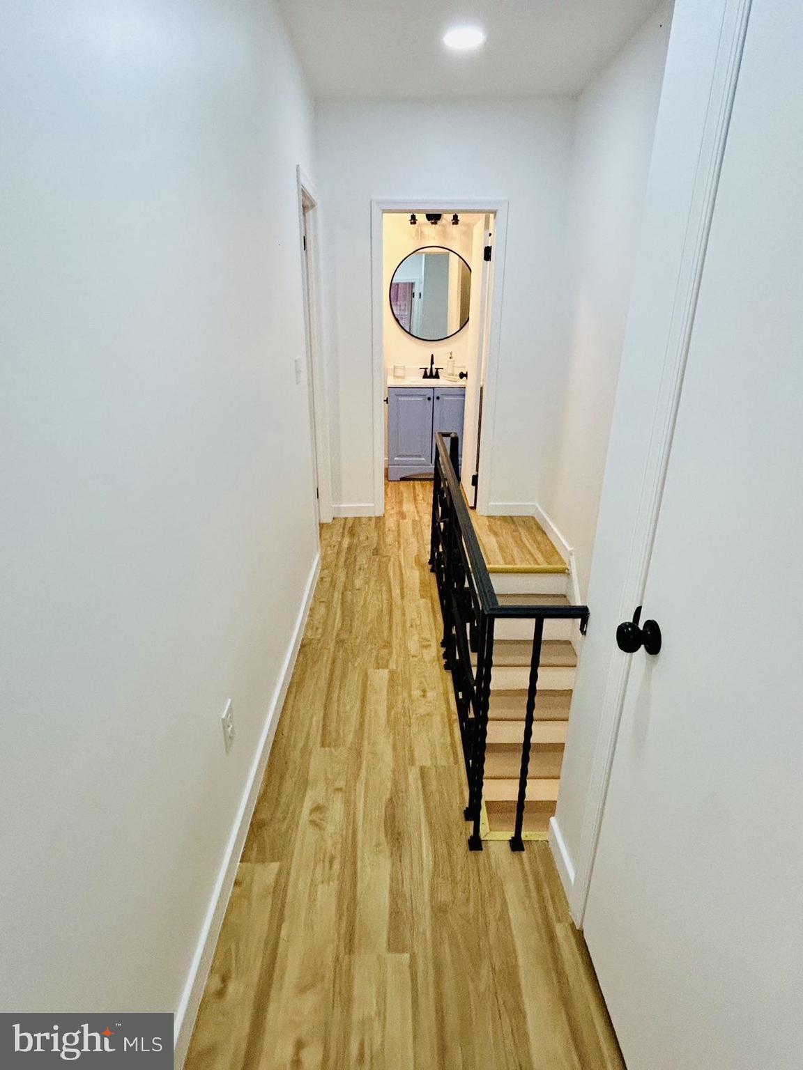 2013 South Bouvier Street Philadelphia, PA 19145 - Photo 7 of 18 a view of a hallway with wooden floor