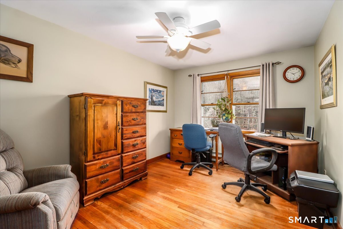 120 Warsaw Street Deep River, CT 06417 - Photo 15 of 39 a view of a workspace with furniture and a window