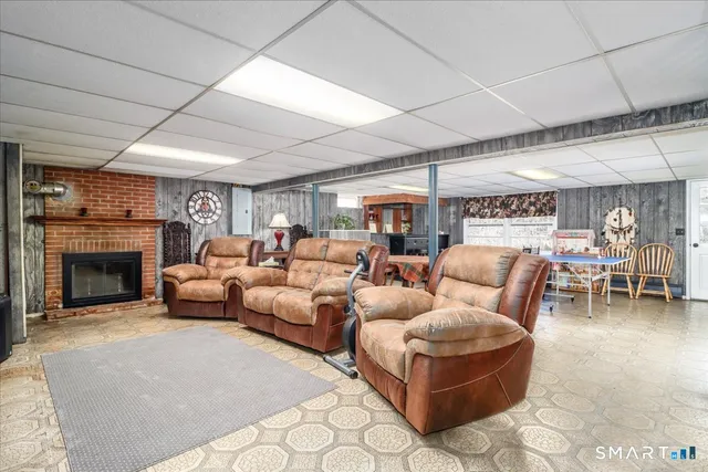 a outdoor space with a lots of furniture and a rug