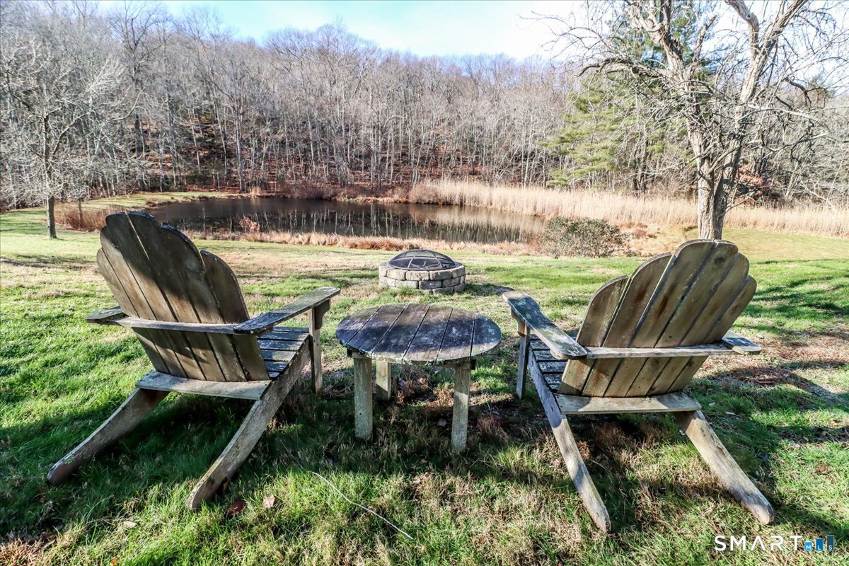 120 Warsaw Street Deep River, CT 06417 - Photo 30 of 39 a view of a swimming pool with a patio and a yard