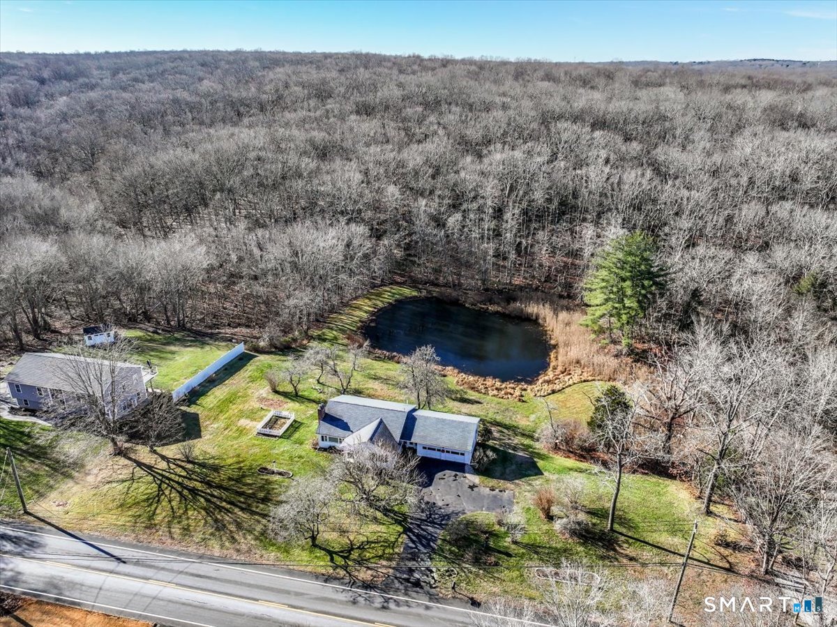 120 Warsaw Street Deep River, CT 06417 - Photo 32 of 39 an aerial view of a house with a yard