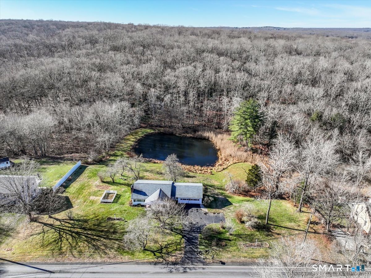 120 Warsaw Street Deep River, CT 06417 - Photo 33 of 39 an aerial view of a house with a yard and lake view