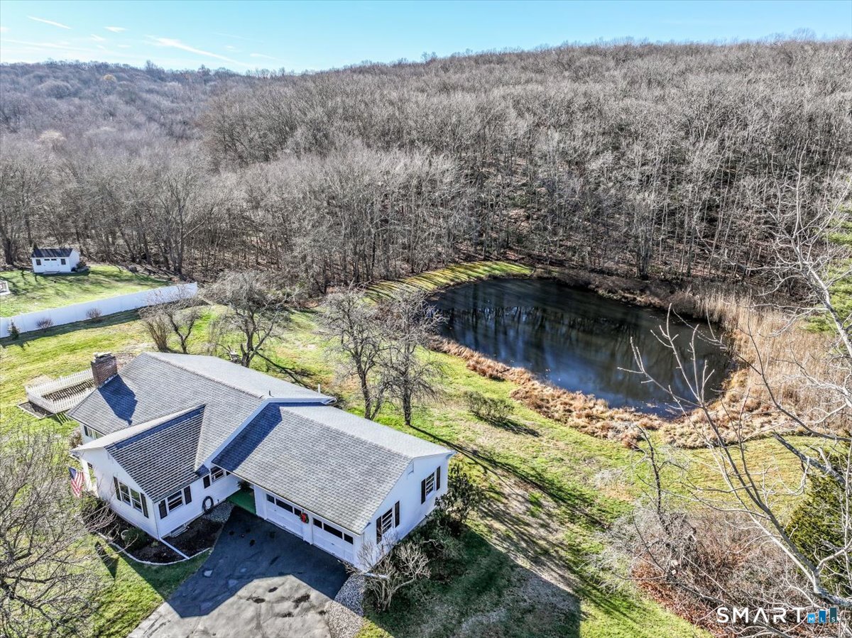 120 Warsaw Street Deep River, CT 06417 - Photo 4 of 39 a view of house with yard and seating area