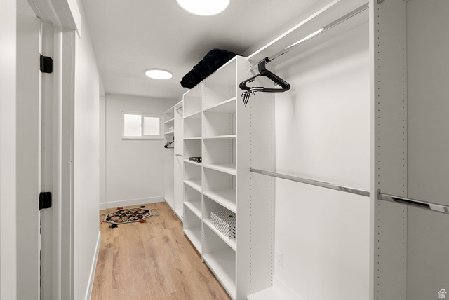 368 Spring Creek Road Providence, UT 84332 - Photo 14 of 45 Walk in closet with light wood-style floors