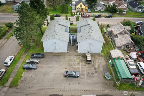 an aerial view of a house with outdoor space