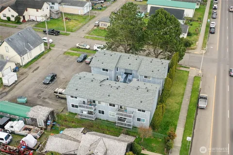 an aerial view of a house with a garden